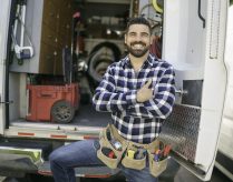 A Portrait of an electrician happy worker at work