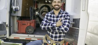 A Portrait of an electrician happy worker at work