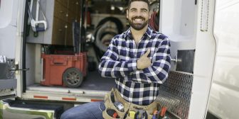 A Portrait of an electrician happy worker at work