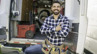 A Portrait of an electrician happy worker at work